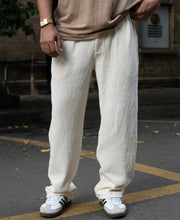 Cream Knit Pleated Trousers