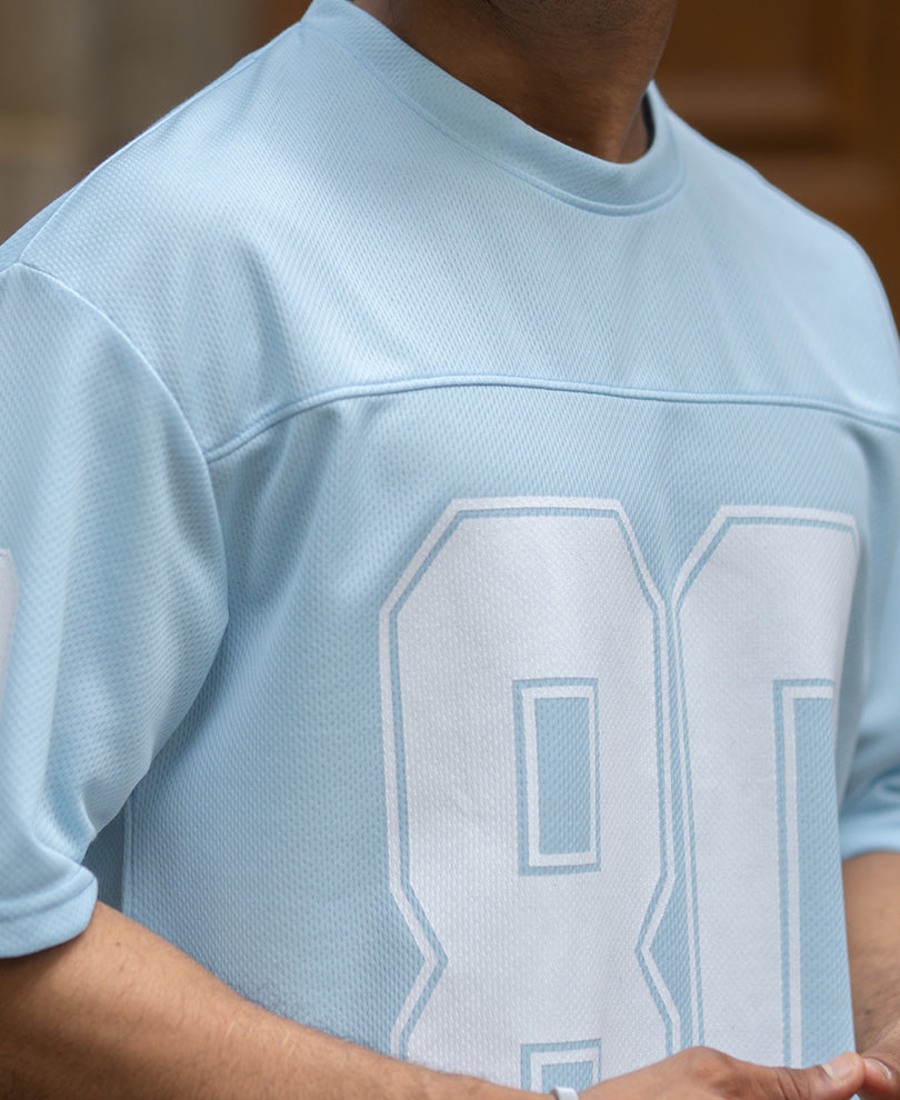 Light Blue Varsity T-Shirt.