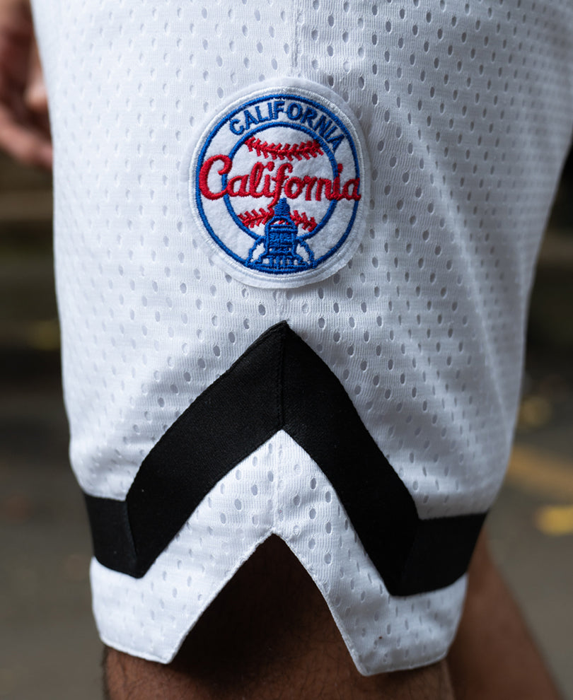 White Embroidered Mesh Basketball Shorts.