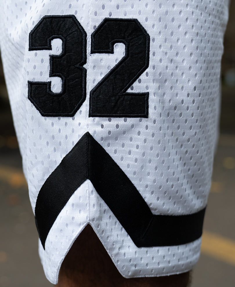 White Embroidered Mesh Basketball Shorts.